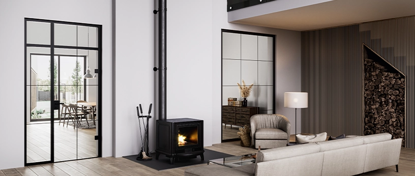 Zweiflügelige Lofttür mit schwarzem Stahlrahmen, die Wohnzimmer und Essbereich stilvoll voneinander trennt.